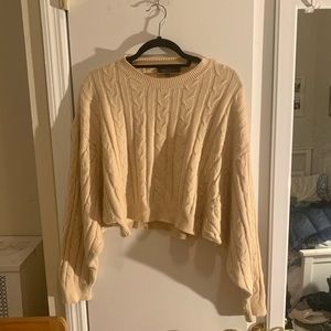 Cream cropped cable knit sweater